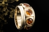 A. Odenwald Ring mit Orange Saphir massiv gefertigt in 750er Gelbgold 