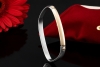 Cartier Armreif Love Motiv Acier et Or Eckige Form 750er Gold und Stahl 