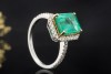Ring Smaragd Emerald Cut gefasst in Gold mit Diamanten in 750er Weißgold 