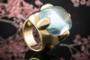 Pomellato Ring Griffe mit imposantem Aquamarin Blau in 750er Gelbgold 