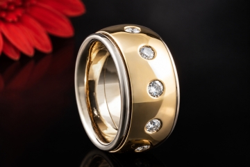 Exklusiver Drehring mit 11 Brillanten Massiv in Gelbgold & Weißgold 750
