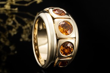 A. Odenwald Ring mit Orange Saphir massiv gefertigt in 750er Gelbgold
