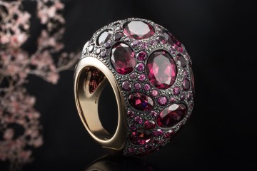 Großer Pomellato Ring Tabou mit Rhodolith Granat in 750er Roségold Gr 54