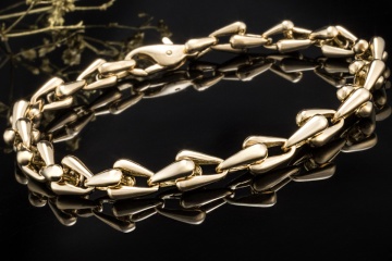 Cartier Armband massiv mit Gliedern und Karabiner in 750er Gelbgold