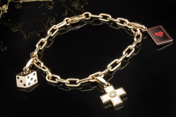 Cartier Spartacus Bettelarmband mit Charms Love CC Kreuz Würfel 750er Gold