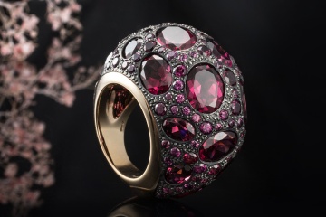 Großer Pomellato Ring Tabou mit Rhodolith Granat in 750er Roségold Gr 54
