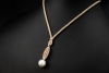 Südsee Perlen Collier mit Diamanten an Kordel in 750er Roségold Weißgold 