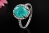 Ring mit Paraiba Turmalin Cabochon 5 Ct. und Diamanten in 750er Weißgold 
