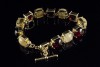Armband mit 40 Carat Rutil Quarz & Granat Cabochons in 585er Gelbgold 