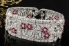 Antikes breites Armband mit Rubin Blumen und Diamanten in 950er Platin 