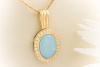Schimmernder Opal Anhänger mit feurigen Brillanten 750er Gelbgold 