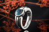 Ring mit blauem Zirkon facettiert in massiver 950er Platin Ringschiene 