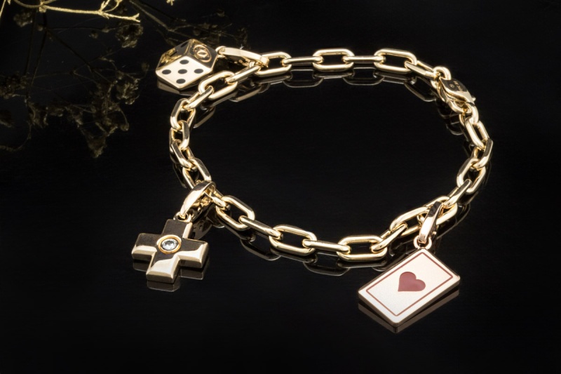 Cartier Spartacus Bettelarmband mit Charms Love CC Kreuz Würfel 750er Gold 