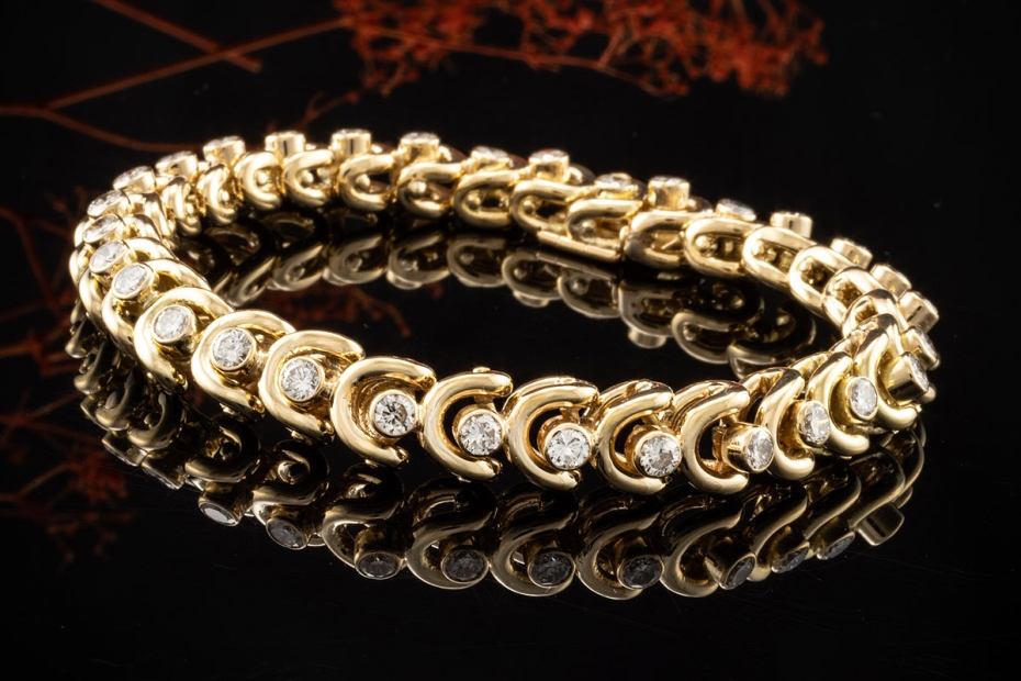Van Cleef & Arpels Armband Vintage Tennisarmband mit Diamanten Gelbgold 