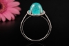 Ring mit Paraiba Turmalin Cabochon 5 Ct. und Diamanten in 750er Weißgold 