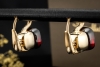Pomellato Ohrringe Ohrstecker Nudo Classic mit Granat in 750er Gelbgold 