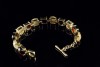 Armband mit 40 Carat Rutil Quarz & Granat Cabochons in 585er Gelbgold 