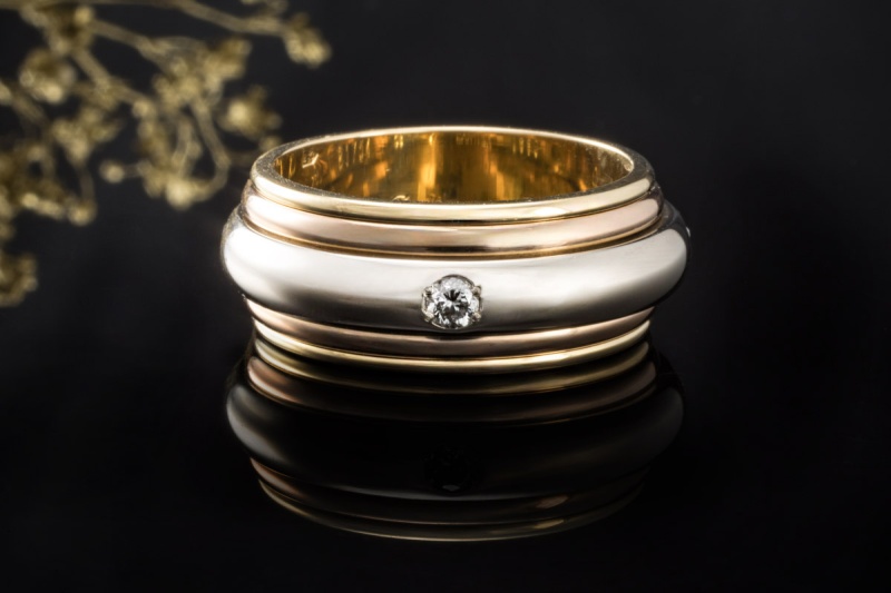 Cartier Drehring Saturn Ring Trinity mit Diamanten in Gold Tricolor 750 