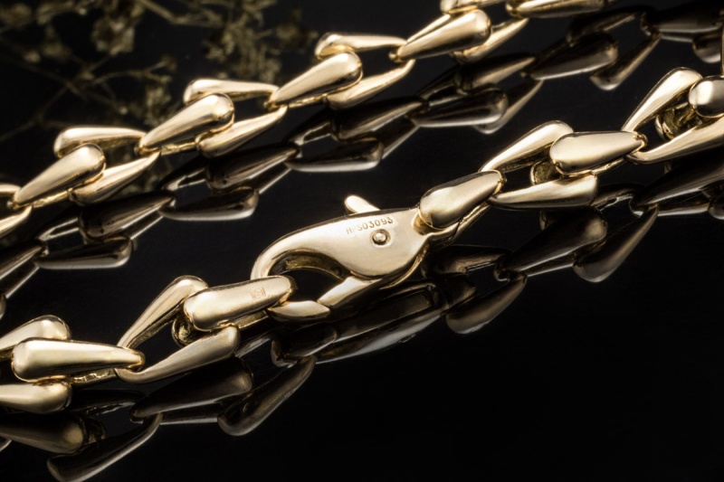 Cartier Armband massiv mit Gliedern und Karabiner in 750er Gelbgold 