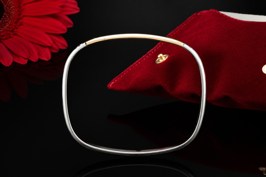 Cartier Armreif Love Motiv Acier et Or Eckige Form 750er Gold und Stahl 