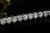 Art Déco Armband mit Diamanten im Hexagon Tennisarmband in 950er Platin 