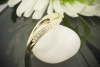 Hoher Ring mit schwungvollem Design in 585er Gelbgold mit Diamanten 