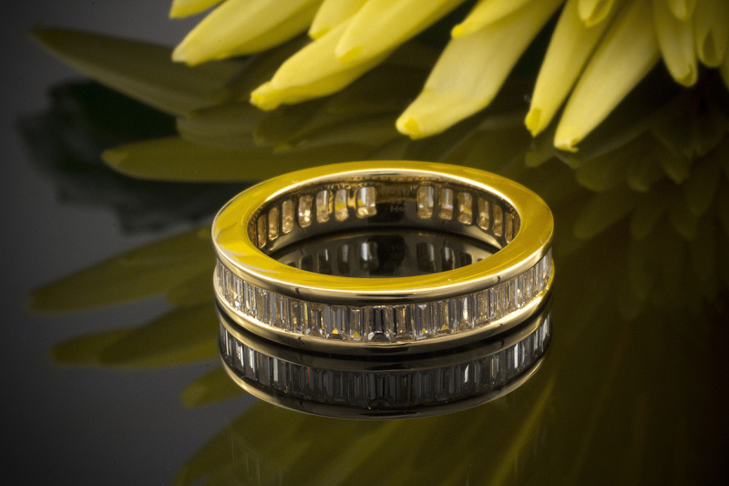 Memoire mit Diamanten 1,50 Ct. Baguette Schliff in 750er Gelbgold Größe 56 