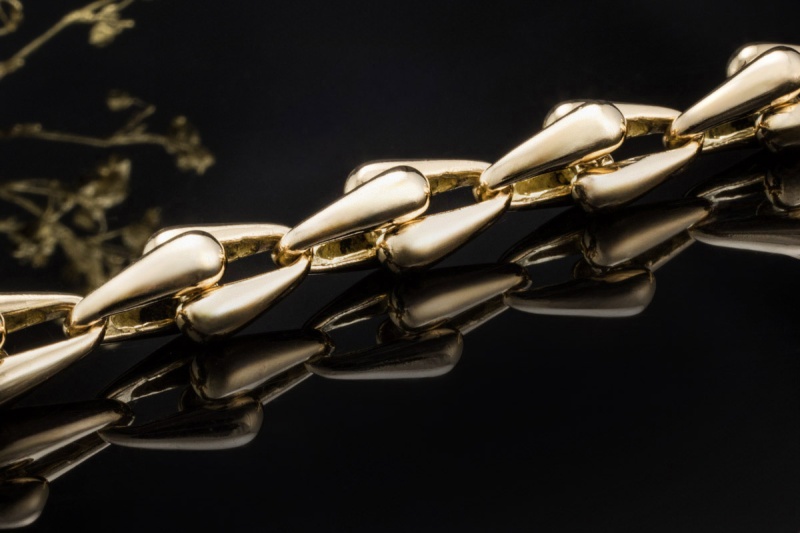 Cartier Armband massiv mit Gliedern und Karabiner in 750er Gelbgold 