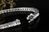 Luxuriöses Tennisarmband mit Baguetteschliff Diamanten in 750er Weißgold 