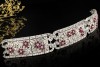 Antikes breites Armband mit Rubin Blumen und Diamanten in 950er Platin 