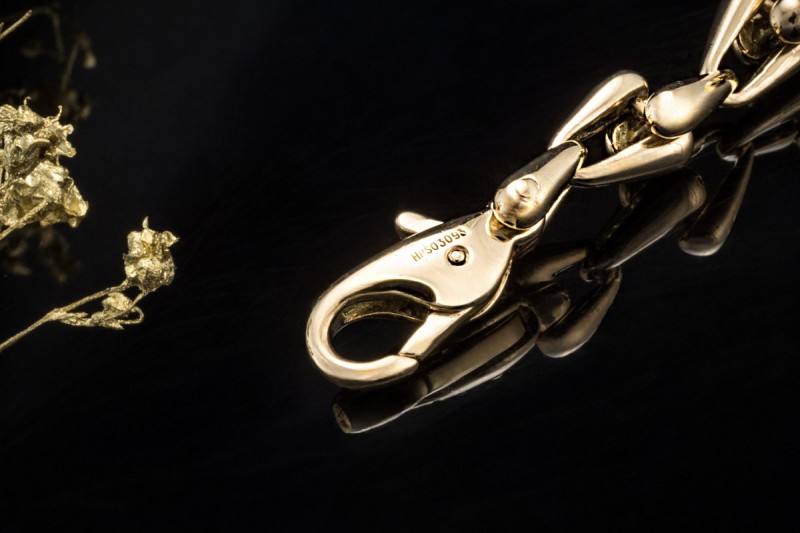 Cartier Armband massiv mit Gliedern und Karabiner in 750er Gelbgold 