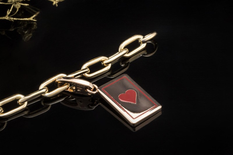 Cartier Spartacus Bettelarmband mit Charms Love CC Kreuz Würfel 750er Gold 