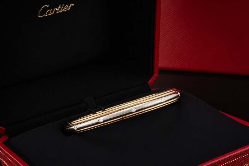 Cartier Armreif Trinity Saturn Drehbar mit Diamanten 750er Gold Tricolor 