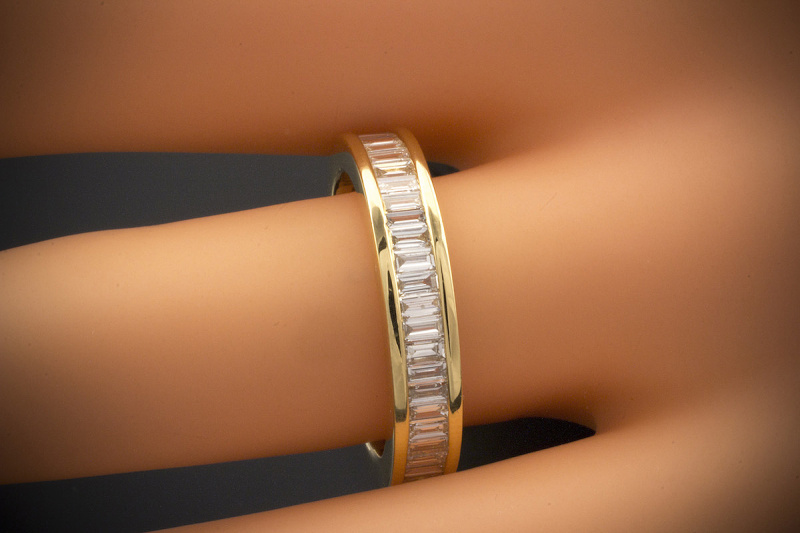 Memoire mit Diamanten 1,50 Ct. Baguette Schliff in 750er Gelbgold Größe 56 