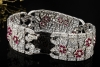 Antikes breites Armband mit Rubin Blumen und Diamanten in 950er Platin 