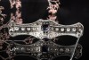 Art Deco Brosche in Platin 950 Tansanit und Diamanten Goldschmiedearbeit 