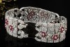 Antikes breites Armband mit Rubin Blumen und Diamanten in 950er Platin 