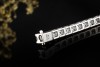 Luxuriöses Tennisarmband mit Baguetteschliff Diamanten in 750er Weißgold 