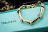 Tiffany & Co Armband Gliederarmband Diamanten in Gelbgold 750 mit Platin 