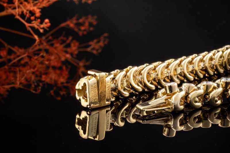 Van Cleef & Arpels Armband Vintage Tennisarmband mit Diamanten Gelbgold 
