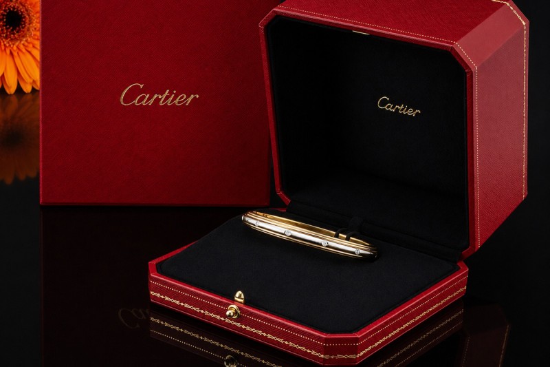 Cartier Armreif Trinity Saturn Drehbar mit Diamanten 750er Gold Tricolor 