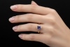 Stilvoller Designer Ring mit Tansanit im Ovalschliff in Gelbgold Arbeit 