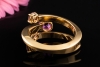 Designer Ring mit 3 violett und rosafarbenen Granaten in 750er Gelbgold 