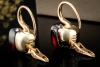 Pomellato Ohrringe Ohrstecker Nudo Classic mit Granat in 750er Gelbgold 