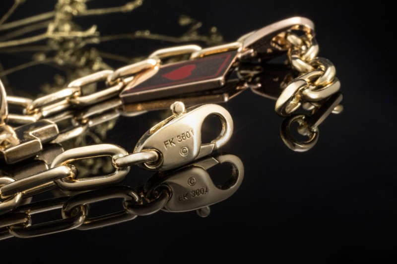 Cartier Spartacus Bettelarmband mit Charms Love CC Kreuz Würfel 750er Gold 